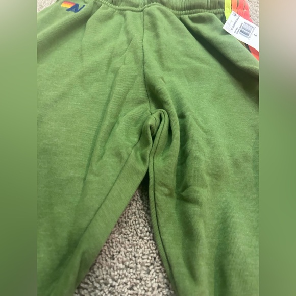 NWT AVIATOR NATION
WOMEN'S 5 STRIPE SWEATPANTS JUNGLE GREEN/NEON RAINBOW - Picture 6 of 8